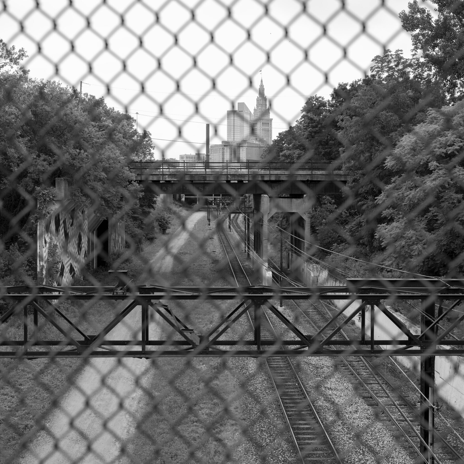 Canal Rd - bridge over train tracks, facing city